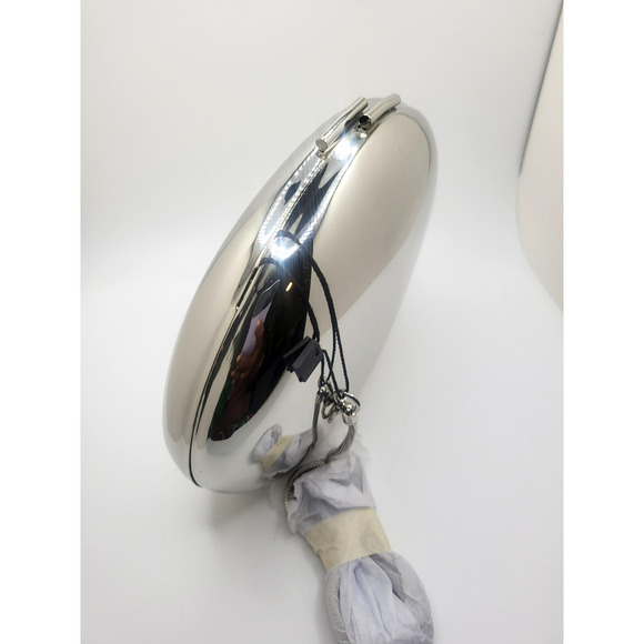 Zara Handbags - ZARA NWT Oval Clutch Solid Silver Metallic Crossbody Chain Black Fabric Lining